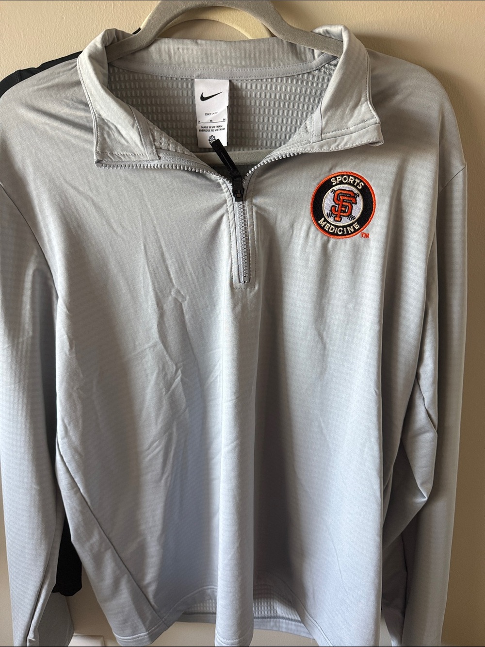 Nike Light Gray Quarter-Zip Long Sleeve Pullover with Orange & Black Logo